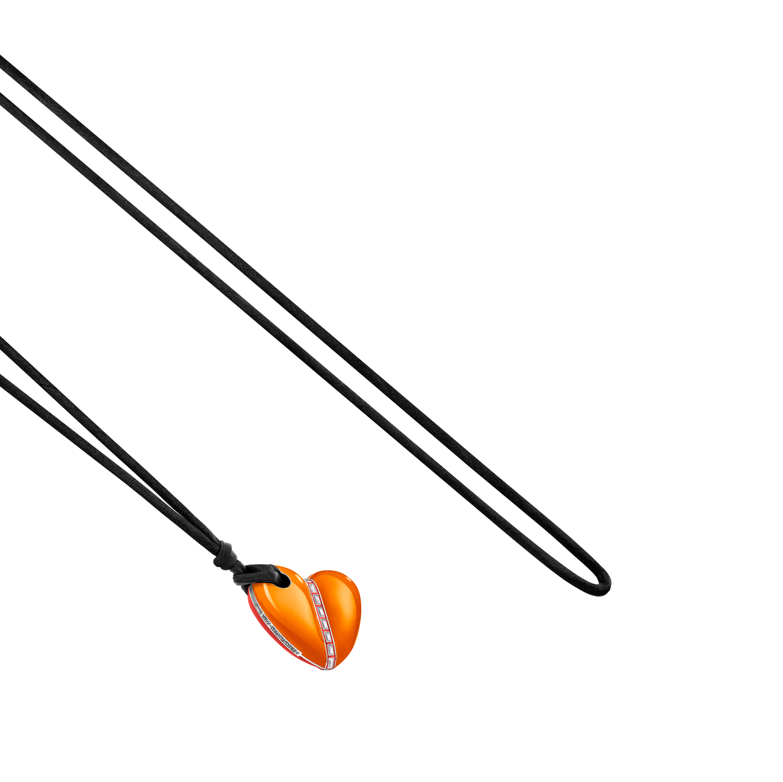 A detail view of Bullet Hole Heart Pendant with Baguettes M
