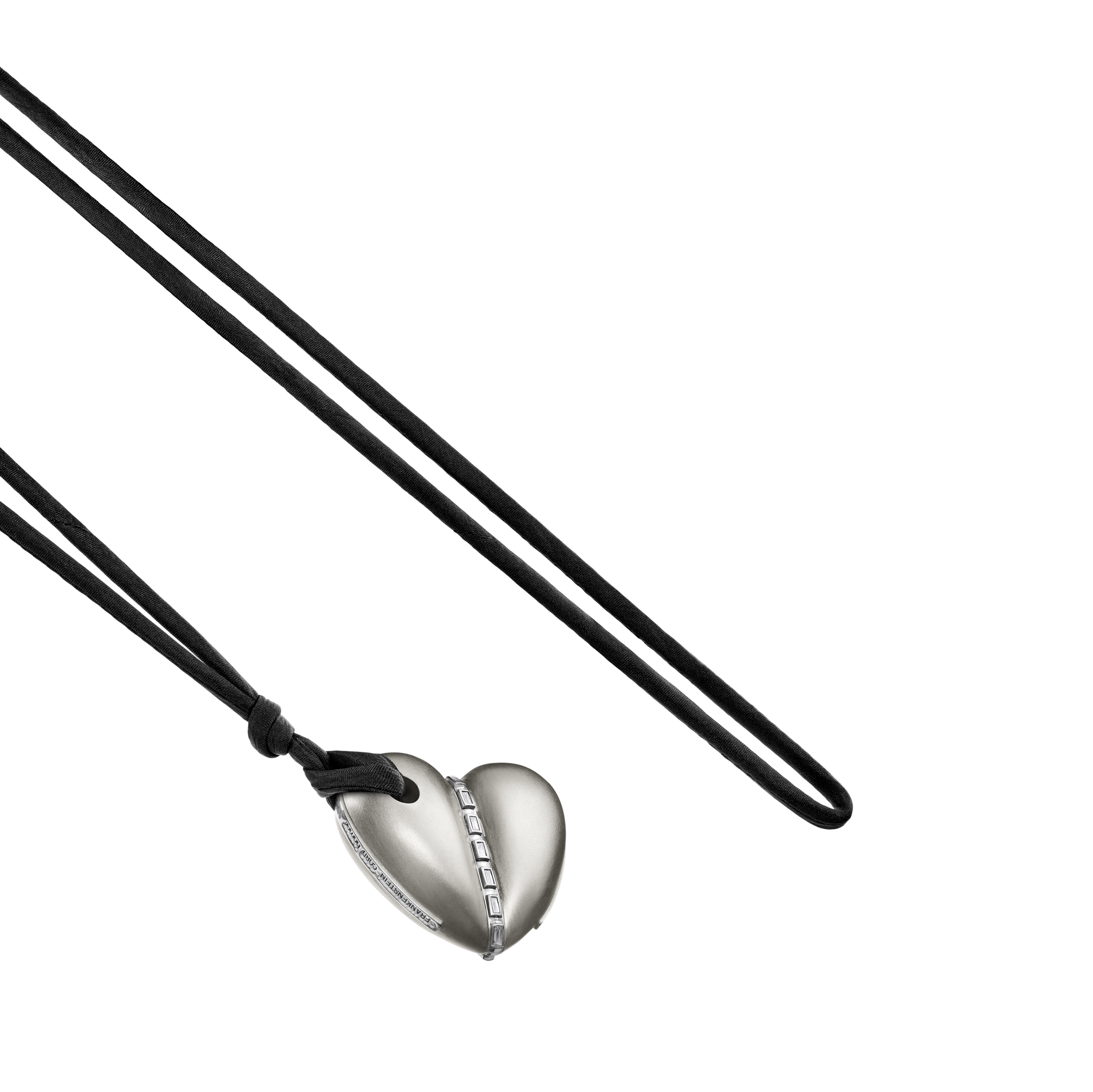 A detail view of Bullet Hole Heart Pendant with Baguettes XL