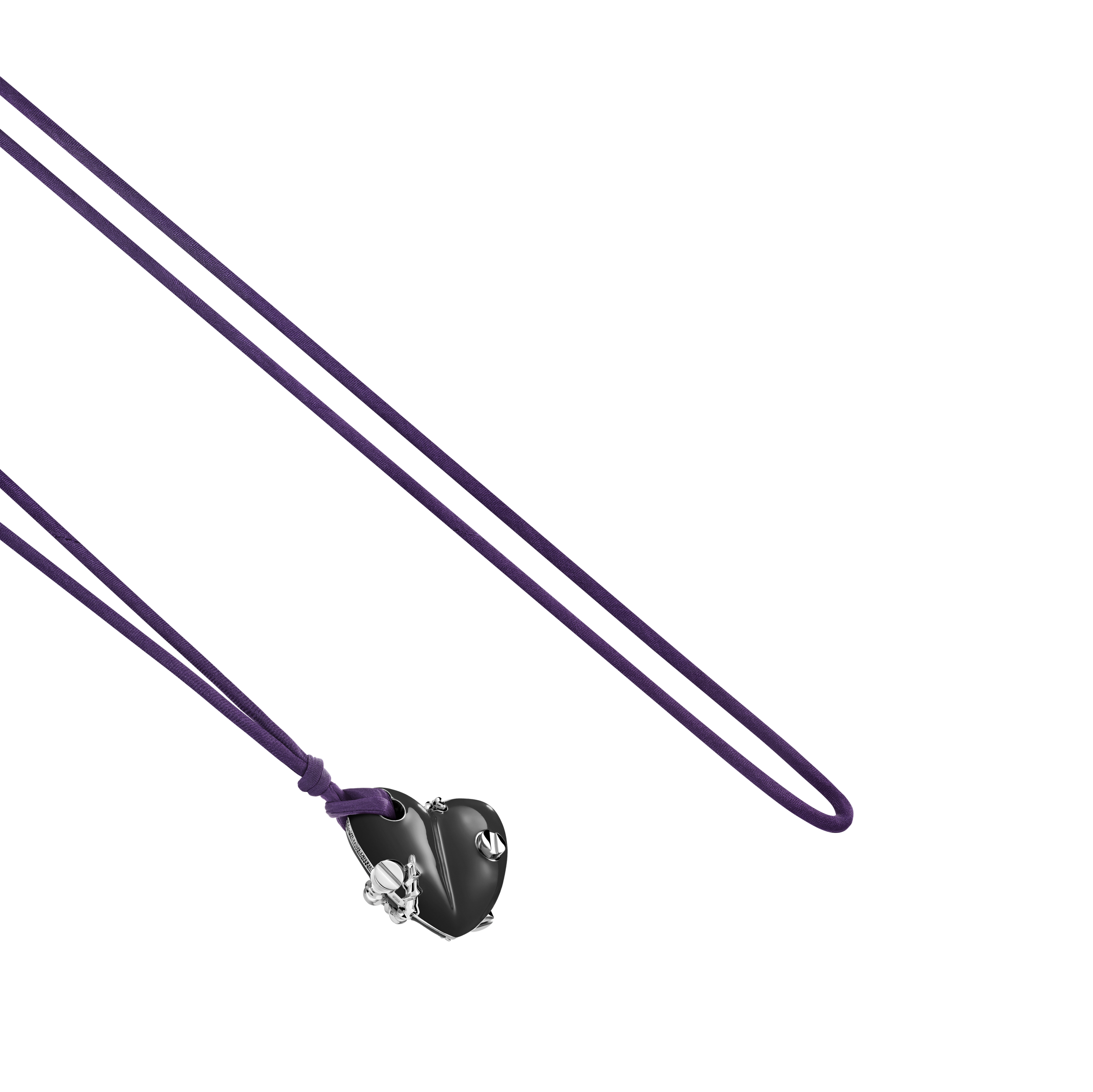 A detail view of Bullet Hole Heart Pendant with Screws M