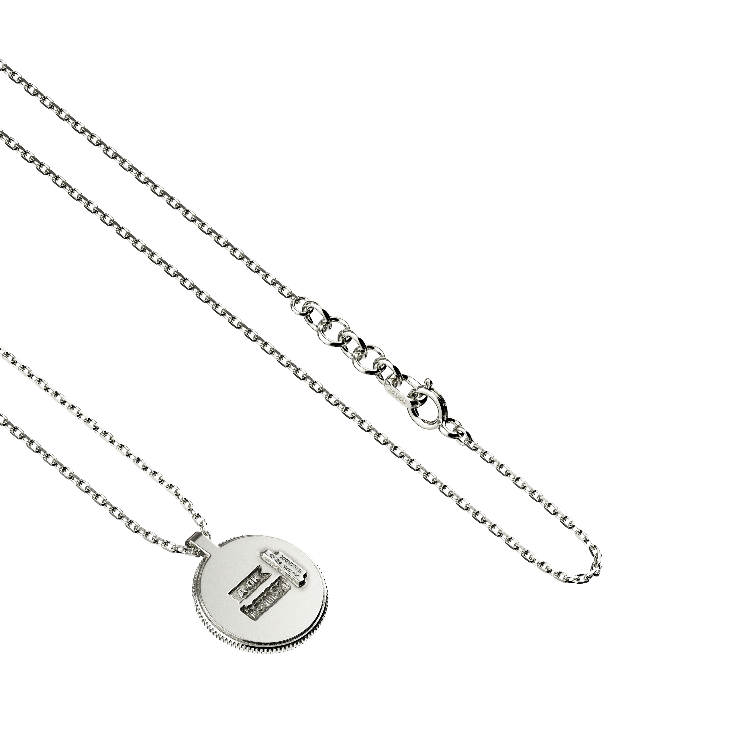 A detail view of Beef Coin Pendant